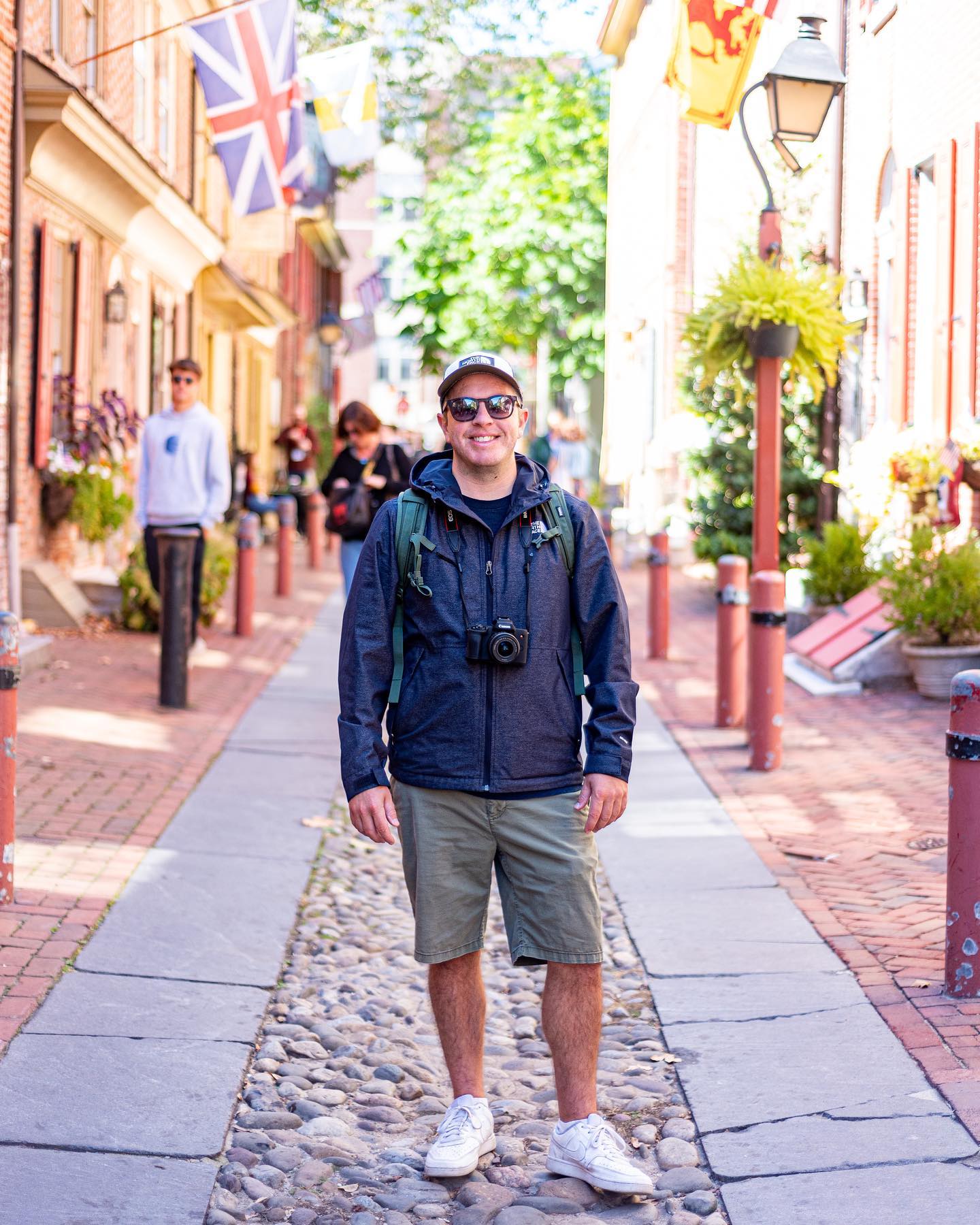 Chris Porto in Elfreth's Alley, Philadelphia — camera in hand